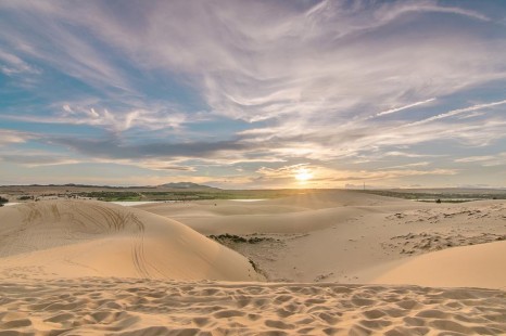 Wide shot of Mui Ne sand dunes at sunrise