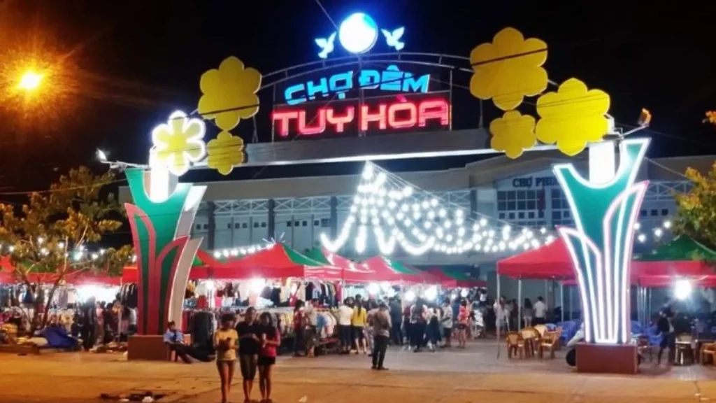 Busy Tuy Hoa night market with colorful food stalls