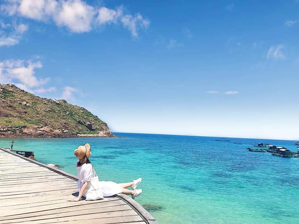 Travelers relaxing at Nhon Hai Beach