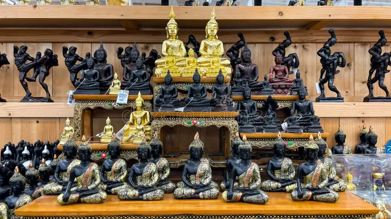 Display shelves of bronze souvenirs