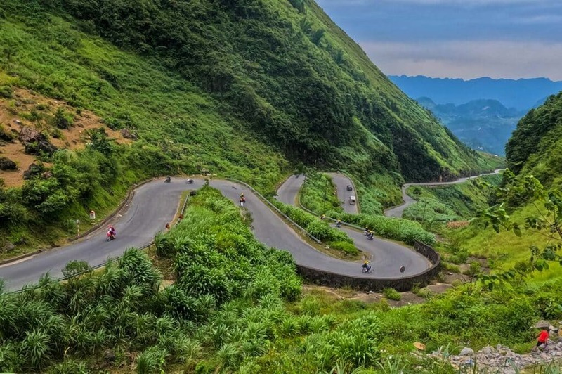 Ha Giang Loop road winding through the Dong Van Karst Plateau